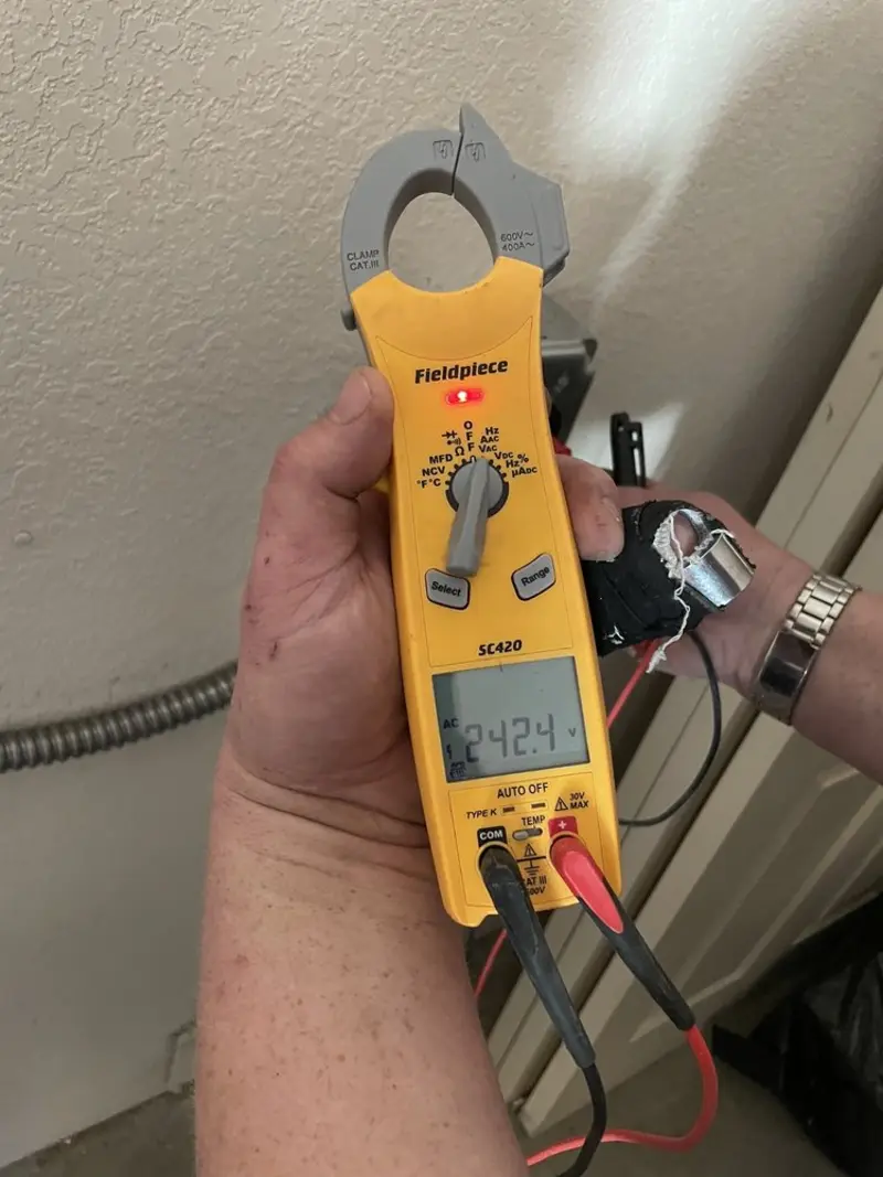 Voltage testing with clamp meter during Circuit Breaker Repair in Ashwaubenon